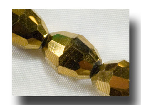 Oval Facet glass beads - 8mm Metallic goldtone - ZSBG78